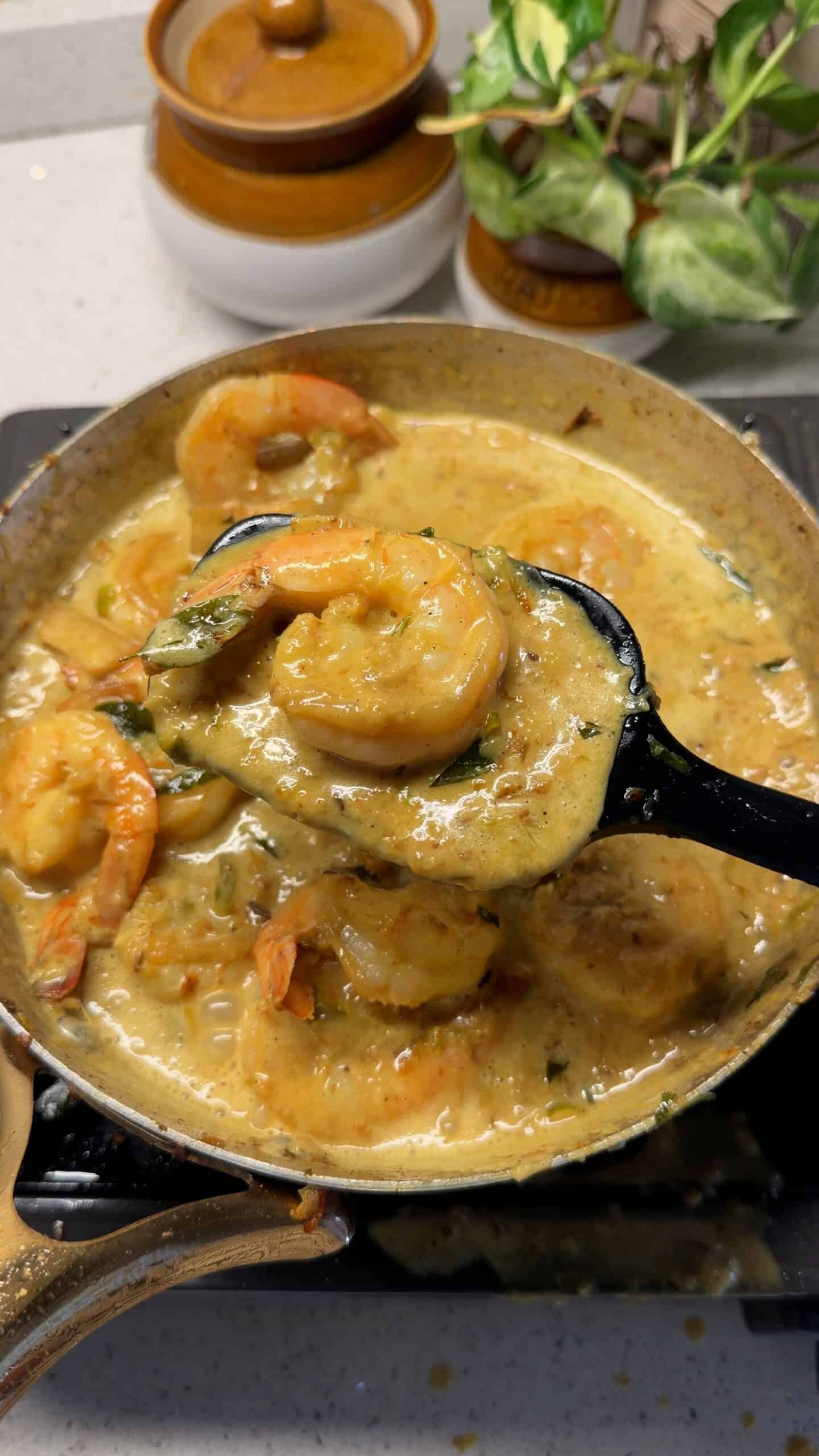 spicy prawn curry in its cooking vessel