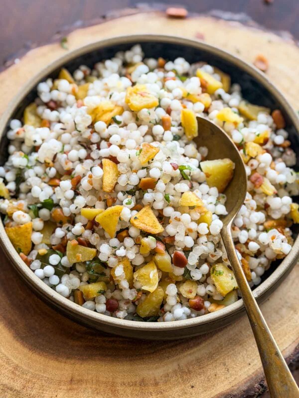 sabudana khichdi served in a bowl with spoon
