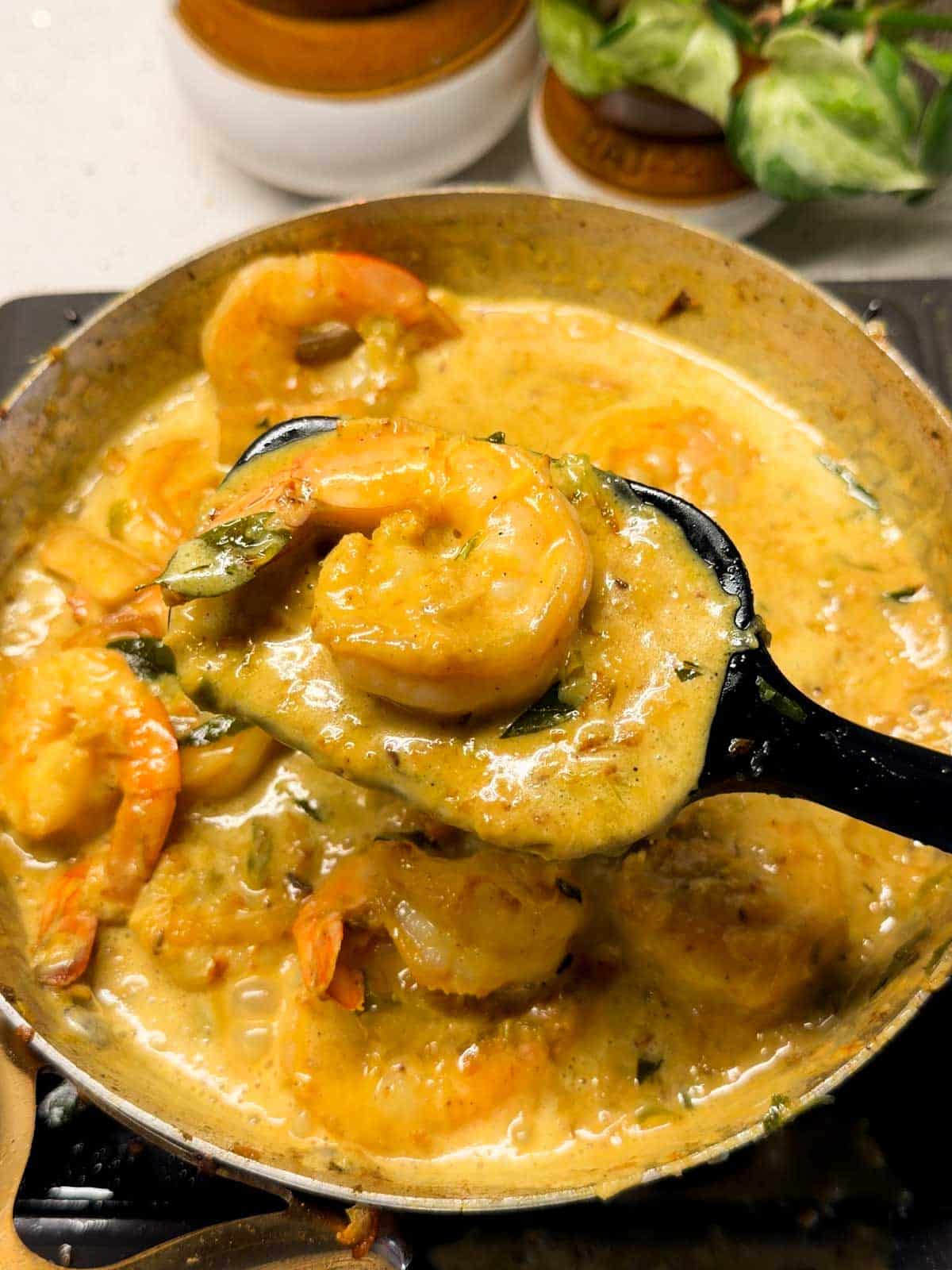 spicy prawn curry in its cooking vessel