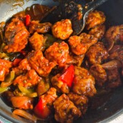 chilli chicken in the wok ready to be served